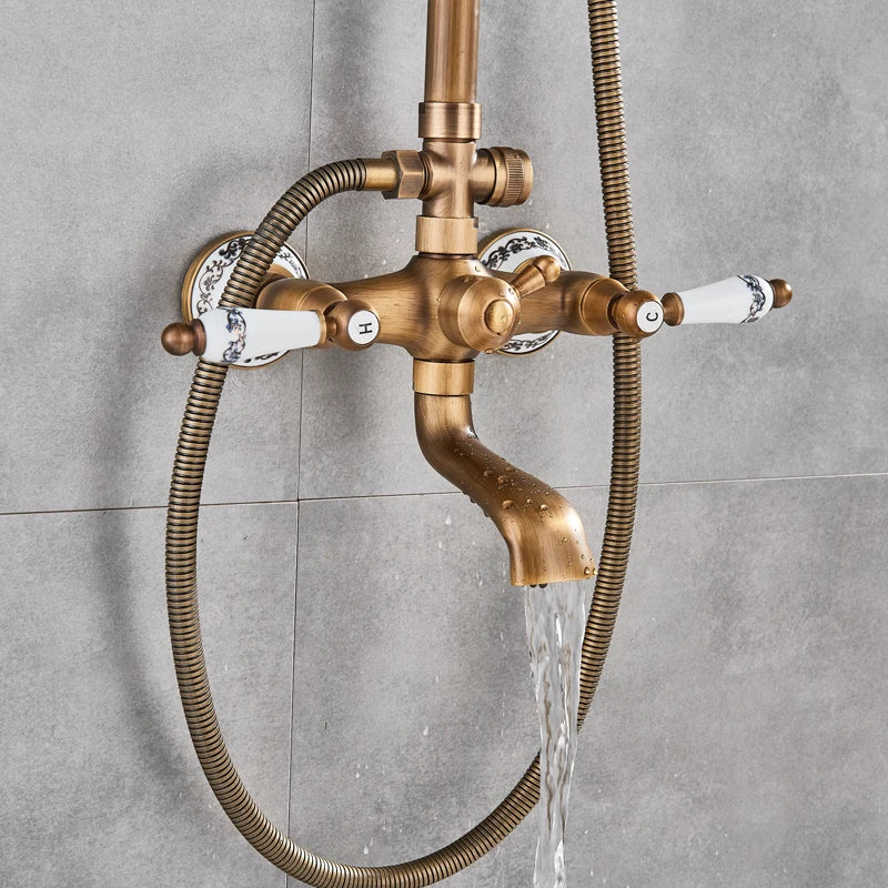 Antique Brass Shower Faucet Set Bathroom Shower Column
with Shelf Rainfall Hot Cold Water Mixer Tap Handhold Shower Faucet