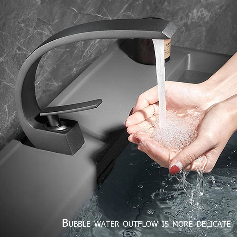 Brass Bathroom Faucet Basin Sink Faucet Single Handle Cold and Hot Mixer T
aps Beautiful Curve Design Deck installation