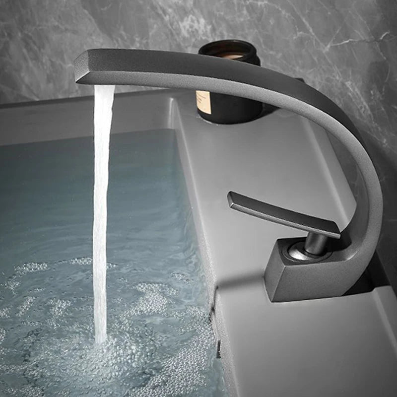 Brass Bathroom Faucet Basin Sink Faucet Single Handle Cold and Hot Mixer T
aps Beautiful Curve Design Deck installation